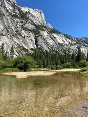 Fototapeta na wymiar A dry Mirror Meadow during the summer in Yosemite National Park, California, USA. During the spring and early summer, the shallow lake refills with water and becomes Mirror Lake.