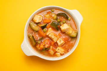 Delicious stew squid with vegetables in bowl