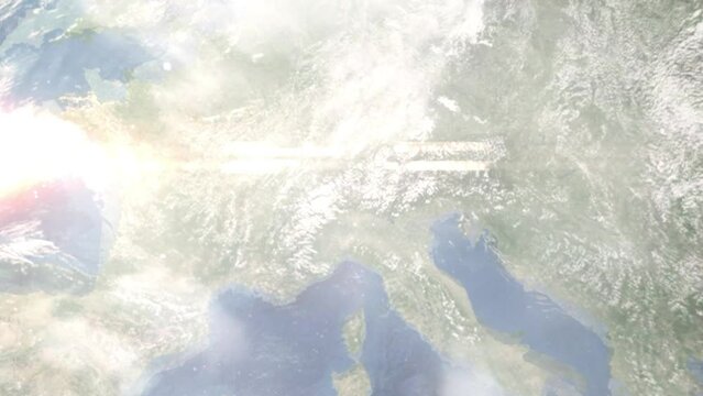 Earth zoom in from outer space to city. Zooming on Bellinzona, Switzerland. The animation continues by zoom out through clouds and atmosphere into space. Images from NASA