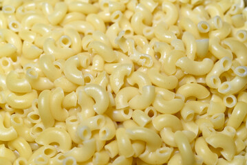 Boiled pasta. Yellow pasta close-up. Delicious breakfast.