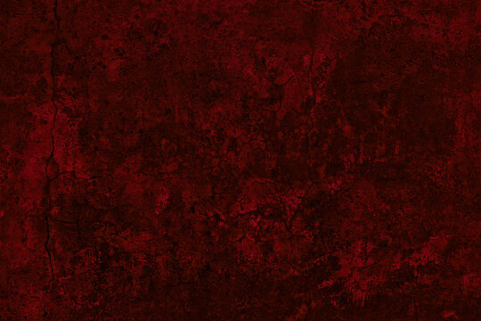Bloody red old cracked concrete wall texture. Dark scarlet color gloomy grunge background