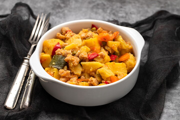 Vegan stew soy meat and vegetables in bowl