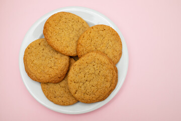 Few homemade cookies on white small dish