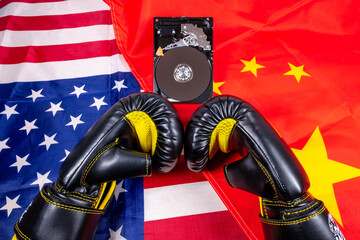 The Clash of Two Powers: Boxing Gloves on Flags of the US and China.