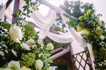 Square arch for a wedding ceremony. beautiful flowers