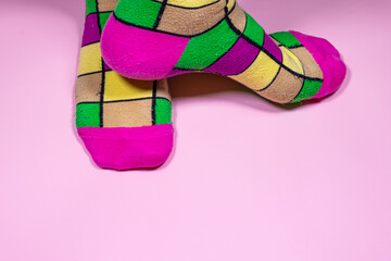 Colorful Socks: A Pop of Fun on a Pink Background