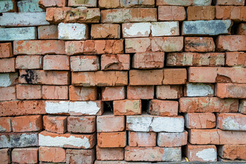 Fototapeta premium Beautiful texture old brick from big wall block, natural structure close up