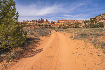 hiking the chesler park loop trail in the needles in canyonlands national park, usa
