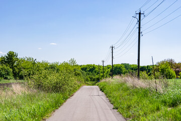 Fototapeta premium Power electric pole with line wire on colored background close up