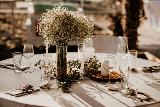 boho wedding decoration flowers nature garden sea sand palm tree nature olive white and green