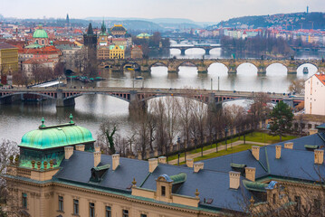 Cityscape of Prague with medieval towers and colorful buildings, Czech Republic