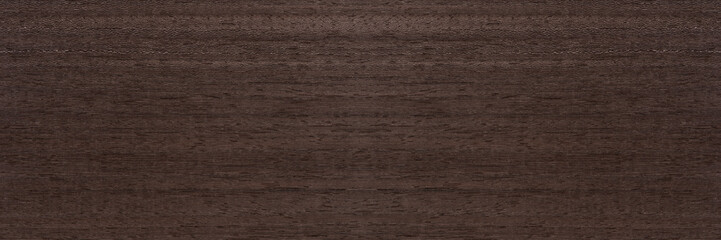 Texture of mahogany. Texture of koto wood with a reddish brown tint. Exotic rare wood from Africa...