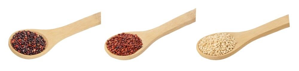 black quinoa seeds in wooden spoon isolated on white background with full depth of field