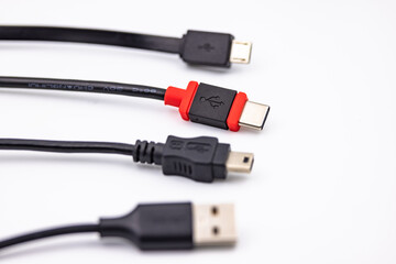 Modern USB-C plug and cable alongside other USB type adapters as new standard