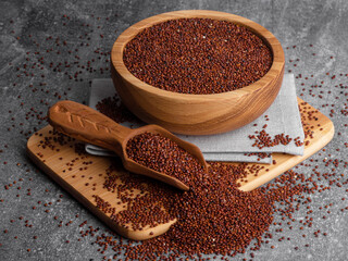 Red quinoa grains. Healthy vegan food concept. Chenopodium quinoa.