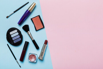 Professional makeup tools. Top view. Flat lay. Beauty, decorative cosmetics. Makeup brushes set and color eyeshadow palette on table background. Minimalistic style