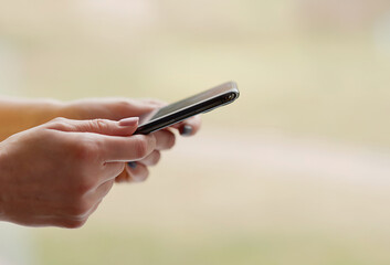 Woman using her Mobile Phone