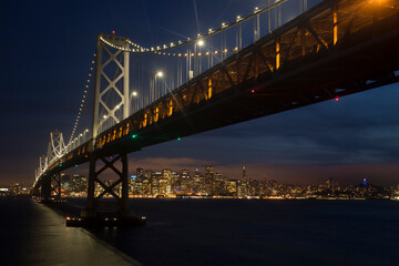 Fototapeta na wymiar San Francisco Bay Bridge and Skyline at Sunset