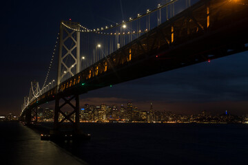 Fototapeta na wymiar San Francisco Bay Bridge and Skyline at Sunset