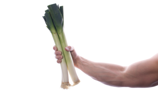 Strong fit man holding leeks in right hand transparent PNG