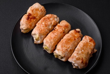 Delicious baked pork or chicken roll with mushrooms, spices and herbs inside