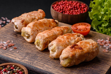 Delicious baked pork or chicken roll with mushrooms, spices and herbs inside