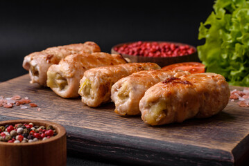 Delicious baked pork or chicken roll with mushrooms, spices and herbs inside