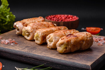 Delicious baked pork or chicken roll with mushrooms, spices and herbs inside