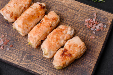 Delicious baked pork or chicken roll with mushrooms, spices and herbs inside