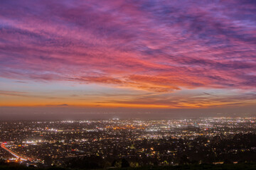 Fototapeta na wymiar Cloudy Purple Sunset Over San Francisco Bay Area