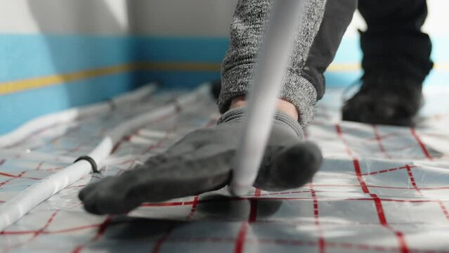 installation of underfloor heating in a new building
