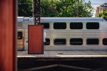 Fototapeta premium L train station with silver train on platform, Chicago Illinois