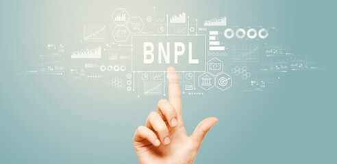 BNPL - Buy Now Pay Later theme with hand pressing a button on a technology screen