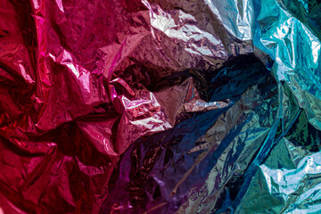 Closeup of colorful wrinkled metallic textured background