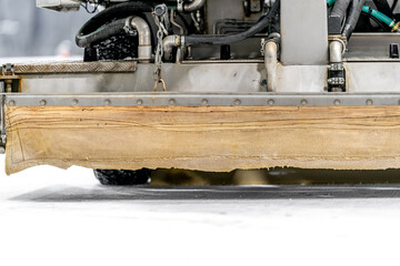 Fototapeta na wymiar detail of the machine for resurfacing the ice surface at the hockey winter stadium
