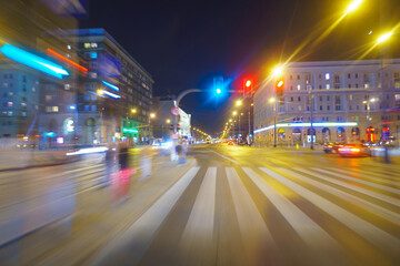 Fototapeta na wymiar Driving through the city at night, motion blur