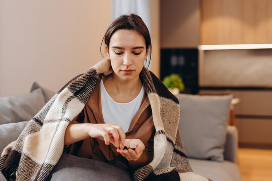 Sick ill woman holding antidepressant painkiller antibiotic pill glass of water take medicine, female handing tablet meds to mouth to relieve pain, health care medicament concept, close up side view