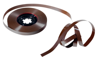 A dusty tape with recorded sound in analog form. Isolated background.