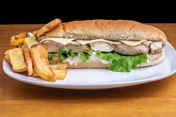 chicken sub with  lettuce and cheese