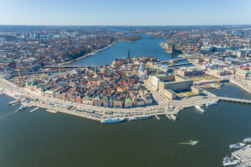 Naklejka premium Stockholm Old Town and One of the most Famous City Island in Background. Sweden. Drone Point of View.