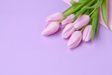Bouquet of beautiful tulip flowers on color background. Women's Day celebration