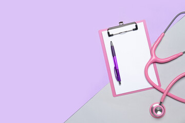 Fototapeta na wymiar Blank clipboard with pen and stethoscope on color background. World Health Day