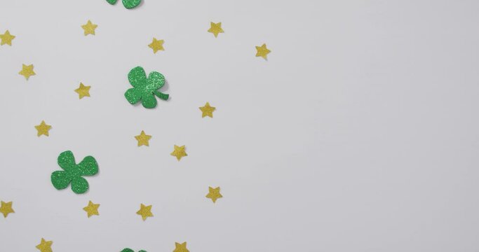 Shamrocks and stars with copy space on white background