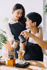 Image of newlywed couple cooking at home. Asia young couple cooking together with Bread and fruit in cozy kitchen in home