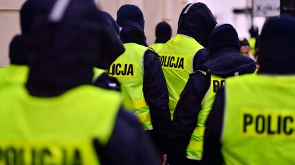 Polish policemen in yellow fluorescent jackets