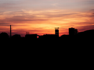 sunset over a coal mine 