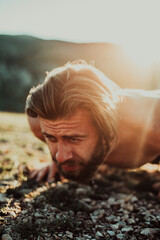 Athlete doing push-ups in the early morning. The concept of a healthy life