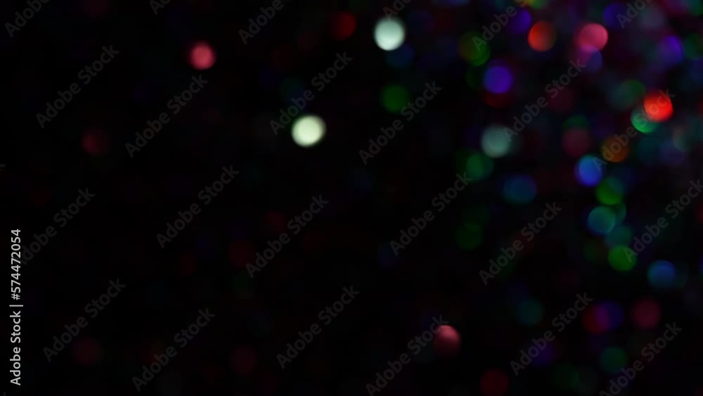 Wall mural small blur neon lights transition. bokeh blur circles shimmering on dark. amazing lens flares light 