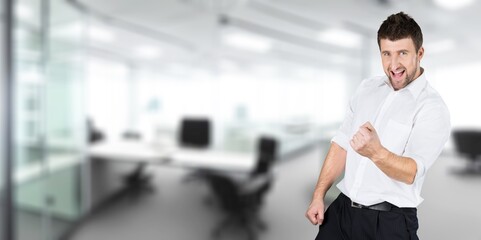 Happy young man with winning expression