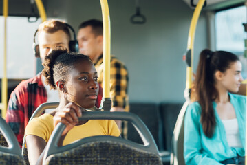 African american woman riding in a bus